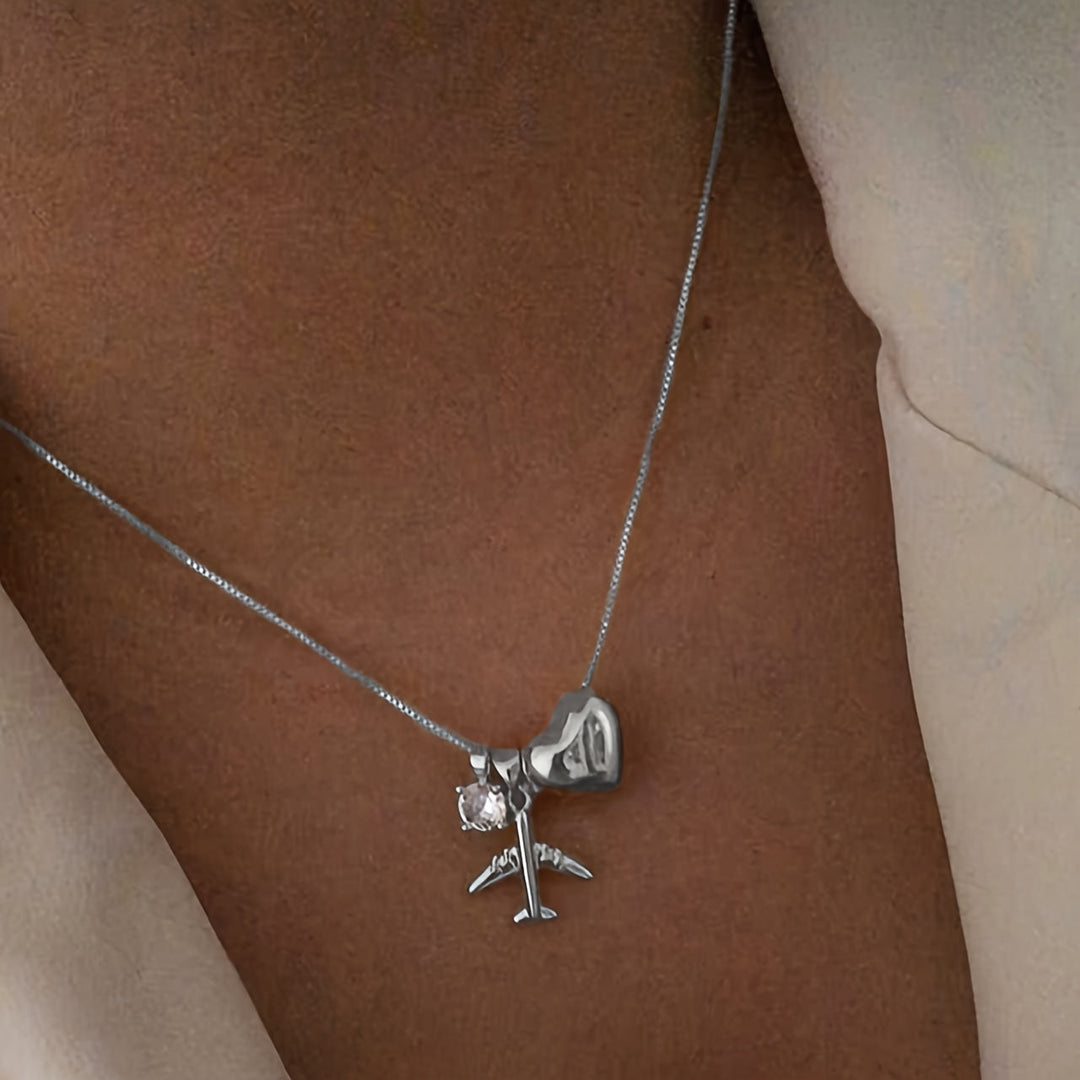 Linda | Minimalistisches Halsband mit Flugzeuganhänger und zartem Stil