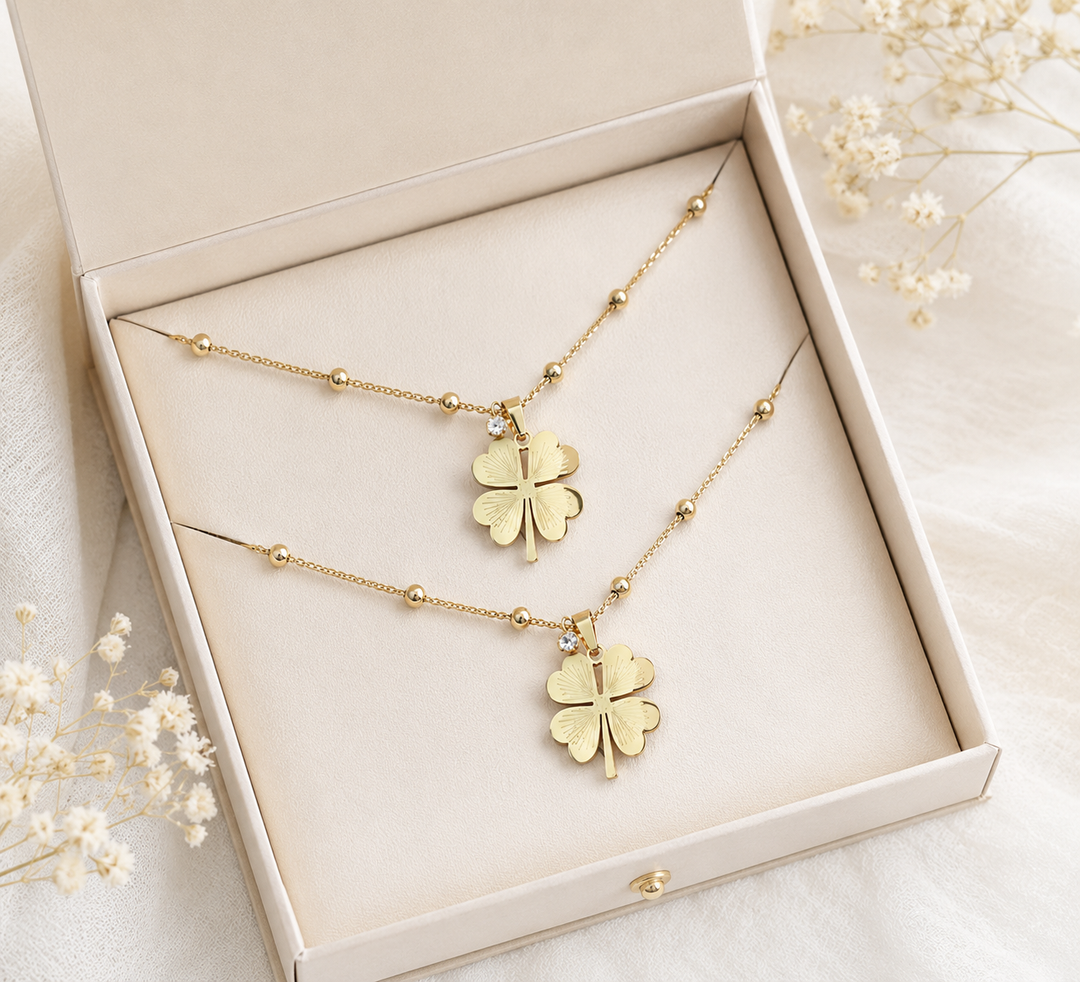 Xyla | Elegantes goldfarbene Stahlkleeblatt-Halskette